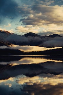 Sunrise with reflections in the Plansee in Tyrol in the Alps in Austria