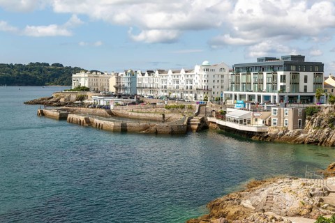 Seafront coastline waterfront, city of Plymouth, Devon, England, UK view west to West Hoe