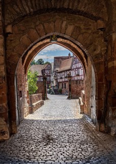 The old castle with Barbarossaplatz and the castle café in the old town centre of Büdingen, Hesse,