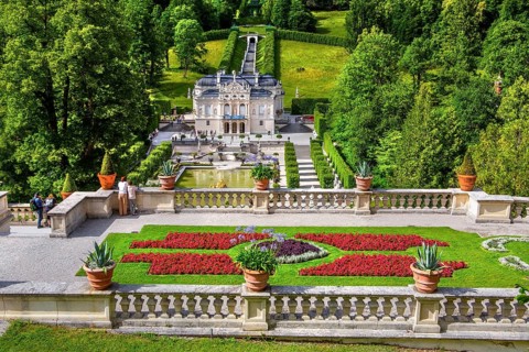 Baroque gardens at the Temple of Venus with a view of the water parterre and Linderhof Palace,