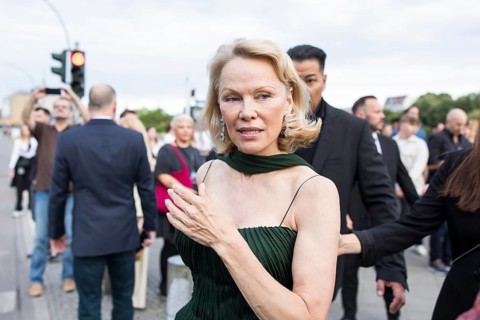 Pamela Anderson attends the film premiere of The Naked Gun at the UCI Luxe East Side Gallery,