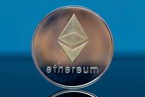 Close-up of a symbolic Ethereum coin