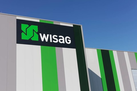 WISAG, logo on industrial building, service company for building technology and infrastructure,