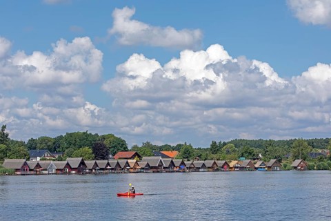 Boathouses, holiday homes on Lake Mirow, canoe, Mirow, Mecklenburg Lake District,