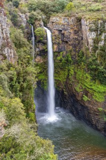 High waterfall in a canyon, Mac-Mac Falls, long exposure, near Graskop, Mpumalanga, South Africa