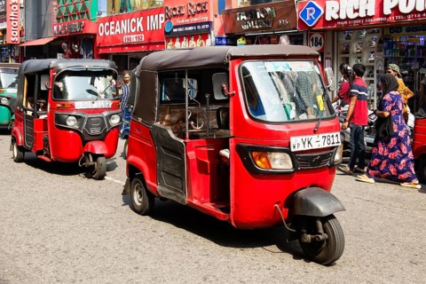 Motorized tuk tuk in a shopping street, Colombo, Sri Lanka