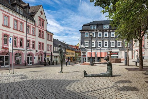 Market street with pharmacy fountain in Ilmenau, Thuringia, Germany
