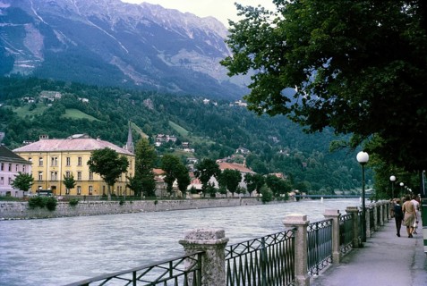 Historic waterfront buildings and pathway, River Inn, city of Innsbruck, Tyrol, Austria, Europe
