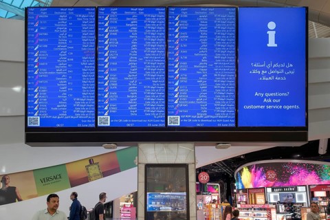 Airport scoreboard departures, Abu Dhabi, United Arab Emirates