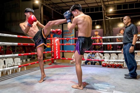 Thai boxing Muai Thai boxer in action, Pattaya, Thailand
