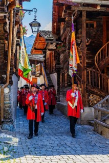 Pipers and drummers accompany the Corpus Christi procession, historic town centre, Grimentz, Val