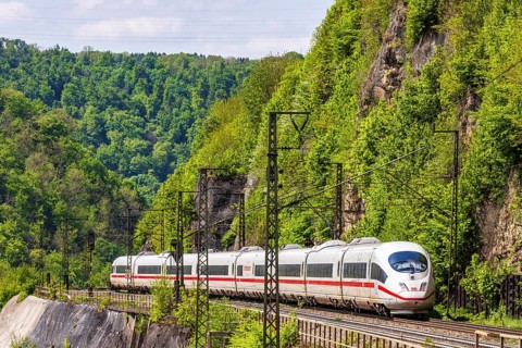 InterCityExpress ICE en route on the winding railway line of the Geislinger Steige. Landscape on