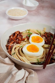 Buckwheat noodles soba with shimeji mushrooms, with boiled egg, green onion, sesame seeds,