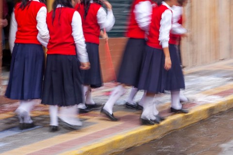 Group of female students walking to the college, Motion blur, City of Otavalo, Imbabura province,
