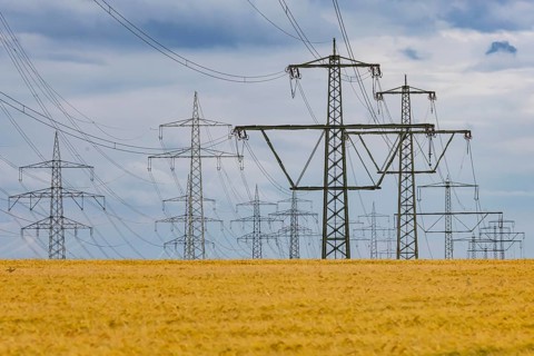 Many high-voltage power lines and lattice towers in the district of Ludwigsburg near Besigheim,