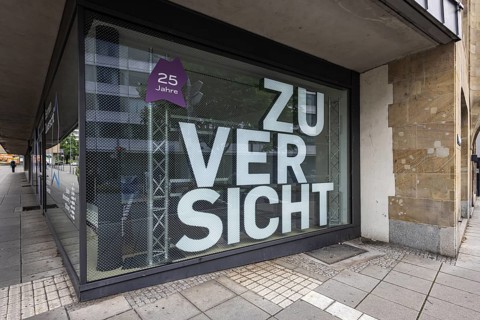 Baden-Württemberg Foundation. Exterior view of the building with logo and claim: German Zuversicht