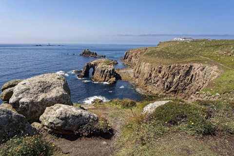 Rock formation and rock gate off the west coast of England in the Atlantic Ocean. Land's End, the