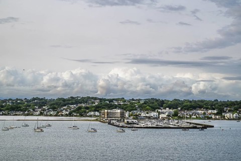 Yachts over Ramshorn Lake and Poole, Brownsea, Dorset, England, United Kingdom