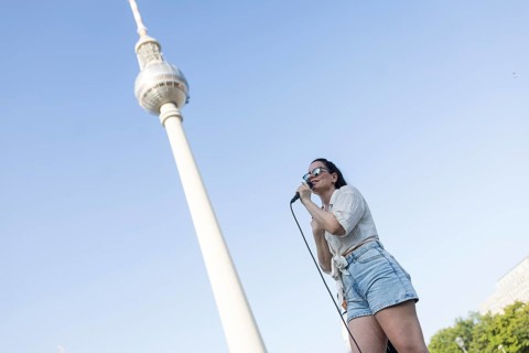 Singer Veronika Bognar on Alexanderplatz as part of the Fête de la Musique. The music event, which