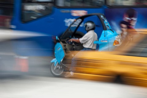 Man riding a motorcycle, Riding at high speed, Photo with motion blur, City of Quito, Pichincha