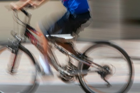 Man riding a bicycle, Photo with motion blur, City of Quito, Pichincha province, Ecuador, South