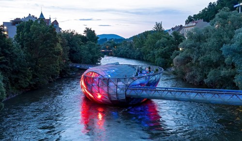 Murinsel floating island on the river Mur by night, Graz, Austria