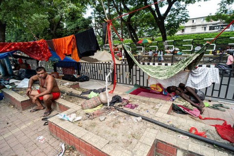 Devotees staying in street divider as they arrives to visit Kamakhya Temple during Ambubachi Mela,