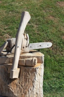 Chainsaw and axe carved from wood as decoration