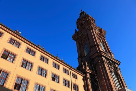Building of the old university of Julius Echter, tower of the new church. Today the building is