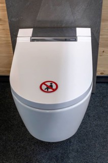 Symbol photo toilet seating ban