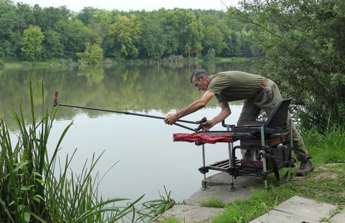 Fisherman, Angler prepares fishing rod for fishing, South Hungary, Hungary, South Hungary, Hungary