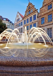 Old market with fountain and town houses in the evening, Bielefeld, East Westphalia-Lippe, North