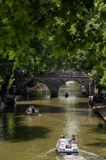 The old town centre of Utrecht, Oudegracht, around 2 km long with many old houses, shops,