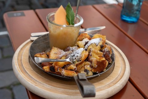 Kaiserschmarrn with apple sauce served in a small pan, Franconia, Bavaria, Germany