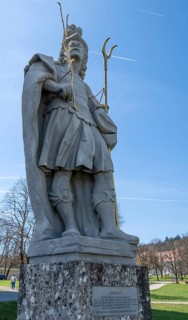Sculpture of the church patron St Theodore in front of the east tower of the baroque Basilica of St