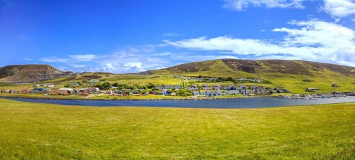 Scotland Shetland scenery in England with cliffs, ocean views and green pastures
