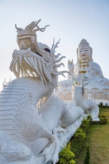 Chinese dragons line the steps up to the Guan Yin (Goddess of Mercy) statue at Wat Huay Pla Kang