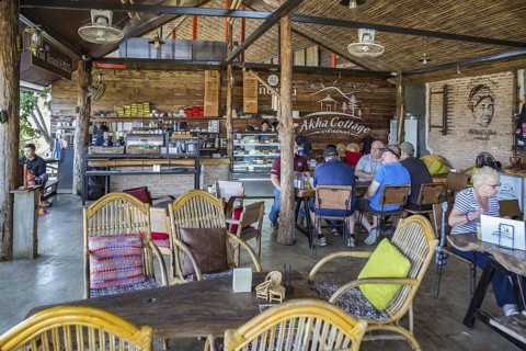 American missionary volunteers eating at the Akha Cottage restaurant and coffee shop in Chiang Rai,
