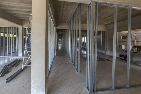 Interior metal stud wall construction utilized in the building of the Grace Language School and