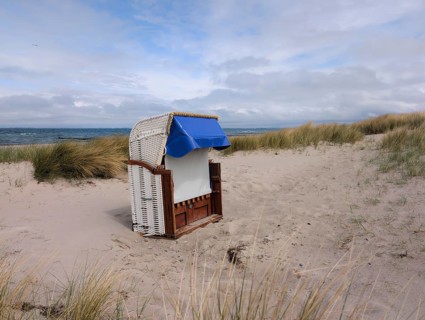 Beach chair dunes Strandwarder in front of Fehmarn bridge Heiligenhafen Baltic Sea Germany