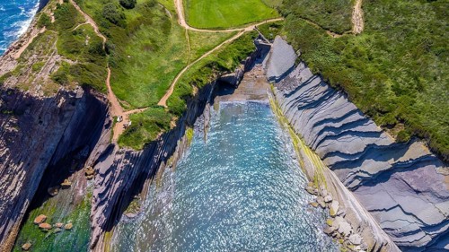 Aerial view of the impressive flysch cliffs of zumaia, basque country, spain, meeting the