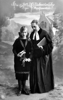 Girl with pastor, 1930, A pastor hands a book to a girl at a confirmation in a church, Historical