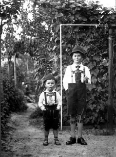 Big and little boy, 1920, Two boys in traditional traditional costume proudly posing in their