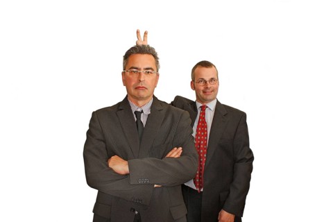 Businessman, two, suit and tie, Berlin, Germany, Two men in suits, the one in the back makes a