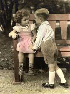 The little lover, 1920s, Two children chatting on a bench in a park, Historical photo