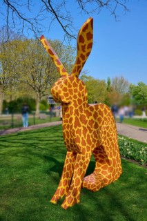 Bunny sculpture with pattern in a park under a blue sky, Keukenhof, Lisse, province of South