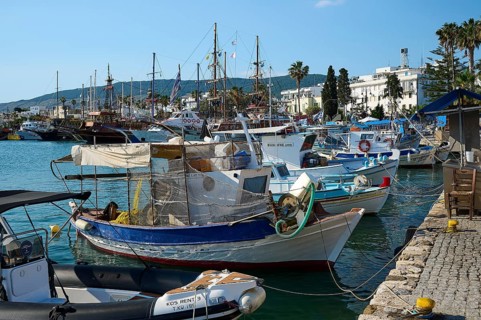 Various fishing boats are anchored in the popular harbour, Harbour, Kos Town, Kos, Dodecanese,