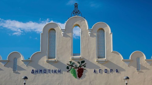 Decorative traditional façade of a market hall under a clear sky, Agora, Market Hall, Kos Town,