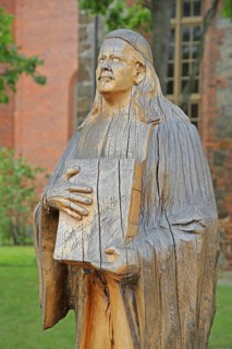Monument from 1911 to hymn poet Paul Gerhardt and book with songbook and inscription to the song :