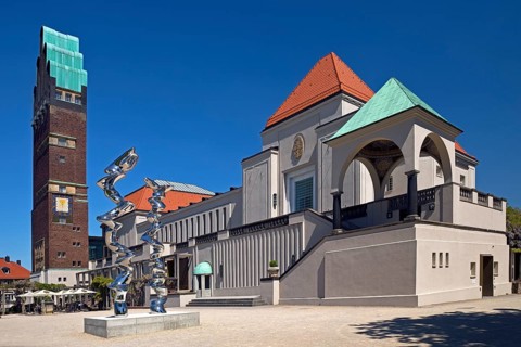 Wedding tower and exhibition building with stainless steel sculpture entitled Points of View by